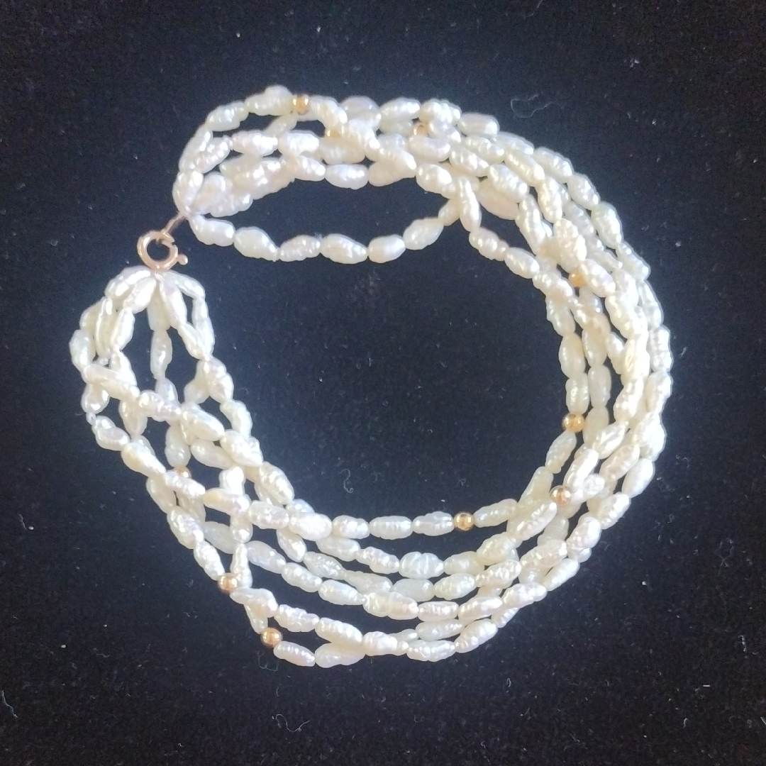 14kt GoldClassic MultiStrand Pearl Bracelet With 14 Kt Gold Beads